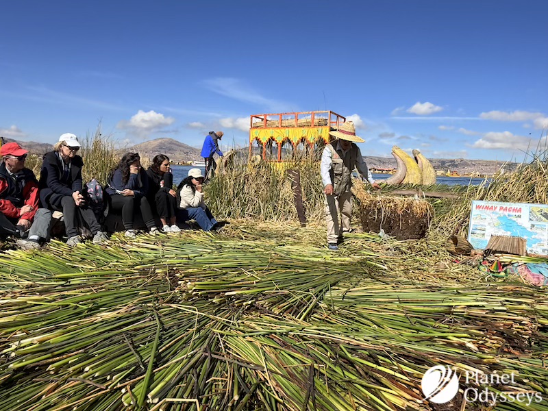 Nestled high in the Andes, Lake Titicaca is a marvel of nature. It is the highest navigable lake in the world. This majestic body of water straddles the border between Peru and Bolivia. Amidst its vast expanse lie the Uros Floating Islands. These islands are a testament to human ingenuity and resilience. Crafted entirely from totora reeds, they float gracefully on the lake's surface. The Uros people have called these islands home for centuries. They originally sought refuge here from hostile neighbors. Today, their unique way of life continues to captivate visitors. Each island is a living, breathing community. The Uros maintain their islands by adding fresh reeds as the old ones decay. This constant renewal is a symbol of their enduring spirit. Visitors to the Uros Floating Island Peru are welcomed with warmth and hospitality. The Uros share their traditions, crafts, and stories with pride. It's an opportunity to experience a culture deeply connected to its environment. A visit to these islands offers more than just stunning views. It provides a glimpse into a lifestyle that harmonizes tradition and modernity. The Uros Floating Islands are a cultural treasure waiting to be explored. The Enchanting Setting: Lake Titicaca and Its Significance Lake Titicaca is more than a geographical wonder. It holds great significance in Andean mythology. Many consider it the birthplace of the Inca civilization. The lake stretches across 3,232 square miles between Peru and Bolivia. Its sparkling waters reflect the sky and surrounding mountains. This creates a magical and serene environment that enchants travelers. Beyond its beauty, the lake serves as a vital resource. Local communities depend on its waters for fishing and transportation. It also supports a unique ecosystem, rich with diverse flora and fauna. Culturally, Lake Titicaca plays a crucial role in the lives of its people. It influences their traditions, beliefs, and folklore. The lake's mystical allure is woven into numerous legends and tales. Key aspects of Lake Titicaca include: It is the highest navigable body of water on Earth, at 3,812 meters above sea level. The lake is shared by two nations, Peru and Bolivia, reflecting its shared cultural heritage. Lake Titicaca nurtures over 500 aquatic species, including endemic fish. Surrounding areas host ancient archaeological sites tied to pre-Columbian civilizations. This extraordinary setting provides a backdrop for exploring the Uros Islands. It invites travelers to immerse themselves in the region's rich cultural and natural tapestry. Origins of the Uros Floating Islands: History and Ingenuity The Uros Floating Islands represent an incredible human innovation. They are a unique response to the challenges posed by the region's history and geography. This ingenuity has enabled the Uros people to thrive on the lake for centuries. Originally, the Uros settled on the islands as a defense mechanism. They sought refuge from aggressive neighboring tribes. By constructing movable islands, they could evade threats and ensure their communities' safety. Creating these islands required significant creativity. The Uros used totora reeds, which grow abundantly in Lake Titicaca. These reeds form the island's base, offering both buoyancy and structure. Maintaining the islands is a continuous process. The reeds decay at the bottom, so new layers are added regularly. This sustains the islands and protects the community. Key historical and innovative practices of the Uros reed island Peru: Using totora reeds for construction and sustenance, including housing and traditional reed boats. Developing movable islands, offering safety and adaptability. Navigating Lake Titicaca's vast waters, cultivating unique fishing techniques. Preserving traditional lifestyles while adapting to modern influences and tourism. This cultural adaptability speaks volumes about the Uros' resilience. Despite environmental and social challenges, they have maintained their way of life. Their history underscores a story of survival and creativity. Through these floating islands, the Uros continue to inspire. They showcase how tradition can blend with practicality to create a sustainable existence. Today, the islands stand as a testament to human ingenuity and cultural persistence. Life on the Reed Islands: Daily Routines and Community Life on the Uros Floating Islands is a delicate balance of tradition and modernity. The residents maintain a lifestyle that has remained relatively unchanged for generations, yet they've adeptly integrated aspects of contemporary life. A typical day begins with the sunrise over Lake Titicaca. The Uros rise early to greet the new day and attend to daily chores. The beauty of their surroundings provides a peaceful start to their busy routines. Fishing is a central part of daily life, vital for both sustenance and economic trade. Men often set out in their reed boats to catch a variety of fish, essential to the Uros diet. Meanwhile, women engage in crafting and weaving. Reed weaving is more than just a necessity; it's an art form. The women create stunning handicrafts and textiles, which are sold to tourists. These crafts reflect the vibrant colors and patterns distinctive to Uros culture. Community life thrives with a strong sense of kinship and cooperation. Shared responsibilities keep the islands running smoothly. Elders play a vital role in passing down knowledge and cultural traditions to younger generations. Celebrations and festivals mark the calendar year with vibrancy. Traditional music, dance, and food are central to these gatherings, strengthening community bonds. Spiritual practices and storytelling also weave through daily life. Key aspects of daily life on the islands include: Fishing as a livelihood and cultural practice. Reed weaving for artistic and economic purposes. Community events that reinforce social connections. Transmission of traditional practices through storytelling and guidance from elders. In this enchanting setting, the Uros balance simplicity with rich cultural traditions. Their way of life offers a profound glimpse into a community that lives harmoniously with its environment. The Art of Reed Construction: Building and Maintaining the Islands The Uros Floating Islands are an extraordinary example of human ingenuity. Crafted from the totora reed, these islands illustrate a unique interaction between nature and human innovation. Creating the islands begins with gathering the essential totora reeds. These plants grow abundantly in Lake Titicaca's shallow waters. The reeds are cut, dried, and layered intricately to form the islands' foundation. The construction technique is both practical and adaptive. The dense layers ensure buoyancy while providing a firm surface. Continuous maintenance is crucial since the lower layers of reeds gradually decay. Every island is a collaborative effort. Families and communities work together to ensure structural integrity. Adding new layers of reeds is a regular task, requiring diligence and unity. Building and maintaining the islands involve: Harvesting totora reeds from the lake. Layering reeds to create a stable, floating platform. Regularly replenishing decayed layers with fresh reeds. Community collaboration for maintaining and repairing the structures. This craftsmanship is not only a necessity but also a cultural expression. The Uros people's expertise in reed construction is passed down through generations. This knowledge stands as a testament to their resilience and enduring way of life. In the interplay of labor and artistry, the islands emerge as both functional habitats and cultural landmarks. They represent a harmonious blend of tradition and skill. Uros Culture: Language, Traditions, and Spirituality The cultural tapestry of the Uros is richly woven with language, rituals, and beliefs. The Uros people primarily speak Aymara, with some fluent in Quechua and Spanish. These languages reflect a deep connection to their heritage and enhance their interactions with visitors. Traditions on the islands are vibrant and full of life. Music and dance play an integral role in Uros culture, serving as vessels for storytelling and celebration. Traditional crafts, such as weaving intricate textiles and crafting reed boats, are taught from generation to generation. The spiritual life of the Uros is deeply tied to Lake Titicaca. The lake is considered sacred, representing a source of life and spiritual sustenance. The Uros people maintain a close connection to nature, evident in their daily practices and rituals. Key aspects of Uros culture include: Preserving Aymara language and engaging in traditional crafts. Celebrating life through music, dance, and oral traditions. Honoring the sacred lake and practicing spiritual rituals. Cultural preservation remains vital for the Uros community. They actively engage in sharing their stories and customs with visitors, ensuring their legacy endures. The islands provide an extraordinary glimpse into a way of life that harmonizes tradition with the natural world. This cultural richness stands as a testament to the resilience and depth of the Uros heritage. The Largest Floating Island: Community Hubs and Social Life The largest of the Uros floating islands acts as the heart of social and cultural life on the lake. Here, several families coexist, fostering a tight-knit community environment. This island serves as a hub for communal activities and shared resources, like schools and meeting areas. Community life revolves around cooperation and mutual support. Families engage in collective tasks such as maintaining the reed structures and organizing local events. Social gatherings often center around communal spaces, where stories, music, and laughter fill the air. Key features of the largest floating island include: Multi-family living with collaborative daily routines. Shared educational facilities and communal meeting spaces. Hosting social events that strengthen community bonds. The island is more than just a living area; it's a place of learning and interaction. Children play and learn together, while adults plan and execute shared projects. This unique social structure reflects the importance of community and togetherness, making life on the floating island both vibrant and harmonious. These social interactions are essential for preserving the rich cultural heritage of the Uros people, ensuring traditions are passed on through generations. Uros Floating Islands Tour: What to Expect and How to Visit Embarking on a Uros Islands tour offers a journey into the captivating world of the Uros people. Visitors can expect a warm welcome as they step onto the soft, springy reed surfaces. Guided tours provide deep insights into the daily life and heritage of these resilient islanders. The tour typically starts with an introduction to the islands' construction. Guides explain the intricate process of weaving totora reeds to form the islands' sturdy base. Visitors often witness a demonstration of how these buoyant islands are maintained and preserved. During your visit, you'll have the opportunity to interact with the island's inhabitants. The Uros people gladly share their traditions, languages, and crafts. Handmade souvenirs, like vibrant textiles and intricate reed boats, are available for purchase, offering a piece of Uros culture to take home. Key experiences to anticipate on an Uros islands tour include: Educational talks on reed island construction and maintenance. Interactive sessions with the Uros people, including craft demonstrations. Stunning views of Lake Titicaca's expansive, serene waters. Travelers interested in an immersive experience might consider staying overnight. Some islands offer homestays, providing a firsthand glimpse into daily life. These stays support the community while offering a truly unique perspective on life in this tranquil setting. Access to the Uros Islands typically begins in Puno, the region's gateway city. From there, numerous tour operators offer packages to suit various interests and budgets. Whether opting for a brief visit or a longer stay, the Uros Floating Islands promise an unforgettable cultural encounter on the shimmering waters of Lake Titicaca. Responsible Tourism: Supporting the Uros and Sustainable Travel Visiting the Uros Floating Islands offers a chance to embrace responsible tourism. By supporting the Uros community, travelers contribute to preserving their unique way of life. A mindful approach to visiting helps protect the delicate environment of Lake Titicaca. Sustainable travel emphasizes respect for both cultural heritage and natural resources. Visitors are encouraged to engage thoughtfully with the community, gaining genuine insights into their traditions. Purchasing locally made crafts directly supports the artisans, providing them with a vital source of income. To ensure a positive impact, consider these tips for responsible tourism: Choose tour operators committed to sustainability and local partnerships. Follow the community's guidelines for behavior and interactions. Avoid using single-use plastics, minimizing waste on the islands. While exploring the floating islands, travelers can foster cultural exchange through respectful dialogue. This engagement enriches the visitor experience while honoring the profound spiritual connection the Uros people have with their land. Together, visitors and locals can create a travel experience that benefits all, safeguarding the islands for future generations. As a result, the enduring spirit and resilience of the Uros community continue to thrive in harmony with their environment. Practical Tips for Content Creators and Travel Agents Content creators seeking to capture the essence of the Uros Floating Islands should prioritize authenticity. Immersing themselves in local experiences will enrich their narratives. Engage deeply with the residents, learning about their daily lives and traditions. For travel agents, crafting an itinerary that highlights both cultural and natural elements is key. Ensure that tours include interactive experiences, such as observing reed boat building or participating in local dance performances. Highlighting the ingenuity and adaptability of the Uros people can make itineraries stand out. To maximize the impact of your content or travel packages, consider the following: Engage with local guides for insider perspectives. Feature compelling visuals like sunrise over Lake Titicaca. Emphasize sustainable practices in your narratives or tours. Incorporating these elements not only elevates the quality of your content but also strengthens the cultural understanding of your audience or clients. By showcasing the vibrant culture of the Uros Islands, you can inspire others to explore these remarkable floating communities responsibly. This approach benefits both the community and the broader travel landscape by fostering appreciation and respect for indigenous cultures. Conclusion: Preserving Heritage and Inspiring Exploration The Uros Floating Islands stand as a powerful testament to human resilience and creativity. They remind us of the importance of sustaining cultural traditions amidst modern challenges. By visiting these unique islands, travelers are invited to witness an ancient lifestyle preserved through generations. The experience of exploring the Uros Islands offers more than just a picturesque setting. It provides a deep cultural insight and an appreciation of sustainable living practices. Whether you're a content creator or a travel agent, sharing the story of the Uros Floating Islands can inspire others to seek out and respect indigenous cultures around the globe. By promoting responsible tourism, we contribute to preserving this heritage for future adventurers. 